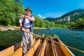 Sromowce Nizne, Poland - August 25, 2015. Dunajec River Gorge. Typical polish raftsman rafts tourists on the Dunajec river.