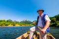 Sromowce Nizne, Poland - August 25, 2015. Dunajec River Gorge. Typical polish raftsman rafts tourists on the Dunajec river.