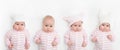 Cute adorable baby child with different warm white and pink hats. Happy baby girl on white background and looking at the