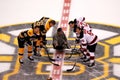SSGT Michael Downing drops the puck