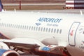 Ssj airplane with Aeroflot logo parked at the airport