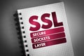 SSL - Secure Sockets Layer acronym on notepad, technology concept background
