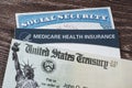 SSN and Medicare cards with US Treasury Check