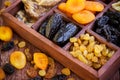 ÃÂssorted dried fruits in wooden box Royalty Free Stock Photo
