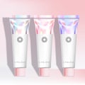 Vector Lip Gloss / Exfoliator / Tint / Stain / Hand Cream Tube in Holographic Tube Packaging Royalty Free Stock Photo