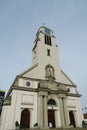 St. Agatha Roman Catholic Church in Dietikon, Switzerland, frontal view. Information poster concerning coronavirus