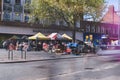 St Albans-UK - 19 May 2021 - People shopping and walking on busy retail high street with market stalls and shops