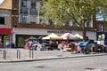 St Albans-UK - 19 May 2021 - People shopping and walking on busy retail high street with market stalls and shops