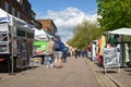 St Albans-UK - 19 May 2021 - People shopping and walking on busy retail high street with market stalls and shops