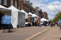 St Albans-UK - 19 May 2021 - People shopping and walking on busy retail high street with market stalls and shops