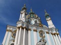 St. Andrew`s Church, blue gold domes against a bright blue sky, Kiev