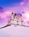 St. Andrew`s Church on the snow-capped at sunset, Church in Kiev, Ukraine