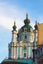 St. Andrew`s Orthodox Church on St. Andrew`s Uzvoz in the Ukrainian capital, Kiev. Golden domes against the blue sky Royalty Free Stock Photo