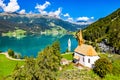 St. Anna Chapel and Submerged Bell Tower of Curon on Lake Reschen in South Tyrol, Italy Royalty Free Stock Photo