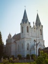 St. Anna Roman Catholic Church facade shine in sun dawn rays, backlit historic Christian temple