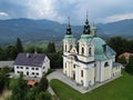 St. Anne\'s Church in Tunjice with church building and Kamnik alps Royalty Free Stock Photo