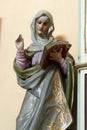 St Anne, statue on the altar of Our Lady of Sorrows in the church of Holy Trinity in Barilovicki Cerovac, Croatia Royalty Free Stock Photo