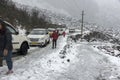 Road blocked due to heavy snowfall at Yumthang valley, sikkim and tourists walking on roads to see the condition