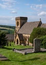 St Barnabas Anglican church, surrounded by a graveyard, in the picturesque English Cotswold village of Snowsill, Gloucestershire. Royalty Free Stock Photo