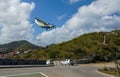 St. Barth Commuter plane landing at Remy de Haenen Airport also known as Saint Barthelemy Airport