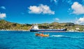 People in boat, big cargo ship, French island, Saint Barth lemy Royalty Free Stock Photo