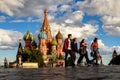 St Basil`s cathedral on Red Square in Moscow, Russia. People walk near old Saint Basil`s temple in central Moscow, focus on Royalty Free Stock Photo