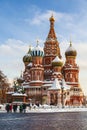 St. Basil`s Cathedral on Red square and tourists near it in winter, Moscow, Royalty Free Stock Photo