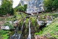 St. Beatus Cave and waterfalls above Thunersee, Sundlauenen, Switzerland