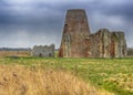 St Benet`s Abbey gatehouse and mill on the Norfolk Broads during a winter storm. Royalty Free Stock Photo