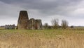 St Benet`s Abbey gatehouse and mill on the Norfolk Broads during a winter storm Royalty Free Stock Photo