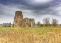 St Benet`s Abbey gatehouse and mill on the Norfolk Broads during a winter storm Royalty Free Stock Photo