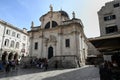 St. Blaise Church of Dubrovnik on Loge Square with tourists