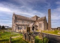 St Canice`s cathedral and cemetery in Kilkenny, Ireland, Europe, during sunny day with blue sky and clear blank space for text Royalty Free Stock Photo