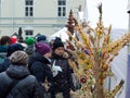 St. Casimir`s Fair. People buying traditional colorful hand made Lithuanian palms