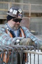 ST. CHARLES, UNITED STATES - Dec 23, 2008: Construction worker setting rebar