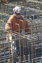ST. CHARLES, UNITED STATES - Dec 23, 2008: Construction worker setting rebar