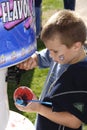 ST. CHARLES, UNITED STATES - Jun 23, 2008: Kid with snow cone
