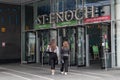 St Enoch shopping centre mall entrance with open doors and young women walking inside