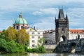 St. Francis Of Assissi Church at the bank of Vltava river and Old Town bridge tower, Charles Bridge over Vltava river, the