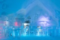 The bar in the world-renowned seasonal Ice Hotel illuminated in blue Royalty Free Stock Photo