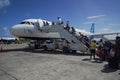 JetBlue plane on tarmac at Maurice Bishop International Airport in Grenada Royalty Free Stock Photo