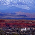 St. George Utah Valley with Mormon LDS Temple Red Cliffs and Snow Covered Mountains Miniature Blur Royalty Free Stock Photo