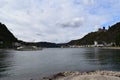 St. Goarshausen, Germany - 09 30 2021: Entry to Lorelei passage with a passenger ship, waterfront of Sankt Goarshausen, Burg Katz