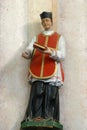 St Isidore statue on the main altar at Saint Ana Church in Rozga, Croatia