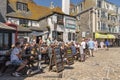Old pub with customers outside. St Ives Cornwall UK