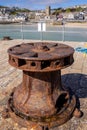 Old rusty Windlass capstan at St Ives, Cornwall on May 13, 2021 Royalty Free Stock Photo