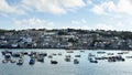 St Ives, harbour with boats and high tide. Popular seaside town and port in Cornwall August 28 2022