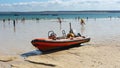 St Ives Harbour at low tide with boat waiting for high tide, Corwall, UK 27 August 2022