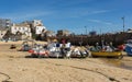 St Ives Harbour at low tide with fishing boats waiting for high tide, Corwall, UK 27 August 2022