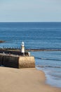 St. Ives, UK - harbour entrance at low tide with Smeatons Pier and lighthouse Royalty Free Stock Photo